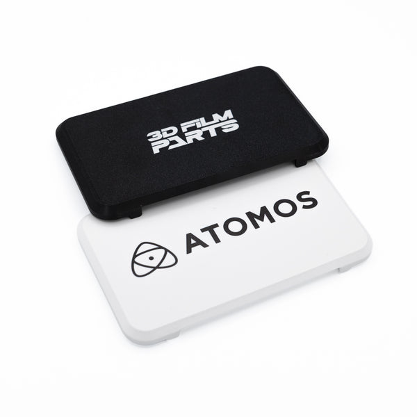 Atomos Shinobi II protective covers in black with the 3D Film Parts logo and white with the Atomos logo